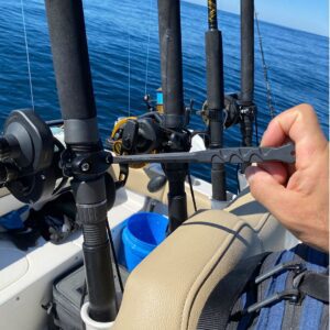 tightening fishing pole with combat flathead