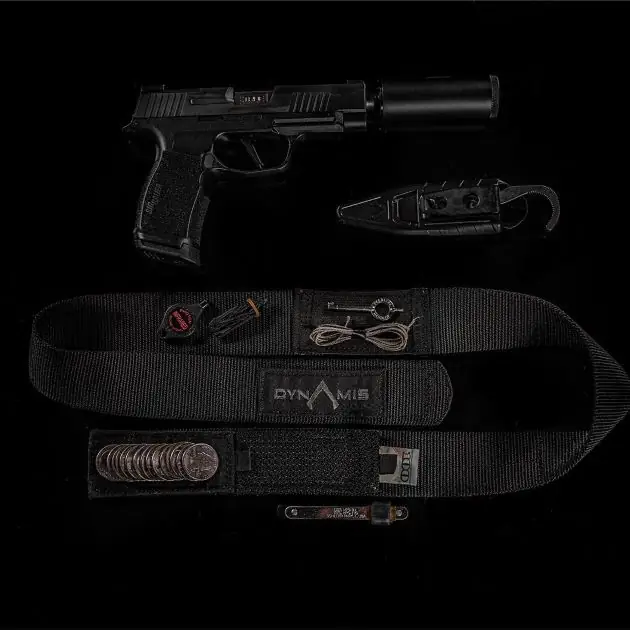 Black logo LOW VIS DYNAMIS LOPRO BELT shown with pistol, SMR blade, and other gear